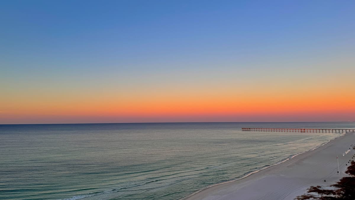 Pompano Beach fishing pier over the Atlantic Ocean at sunset